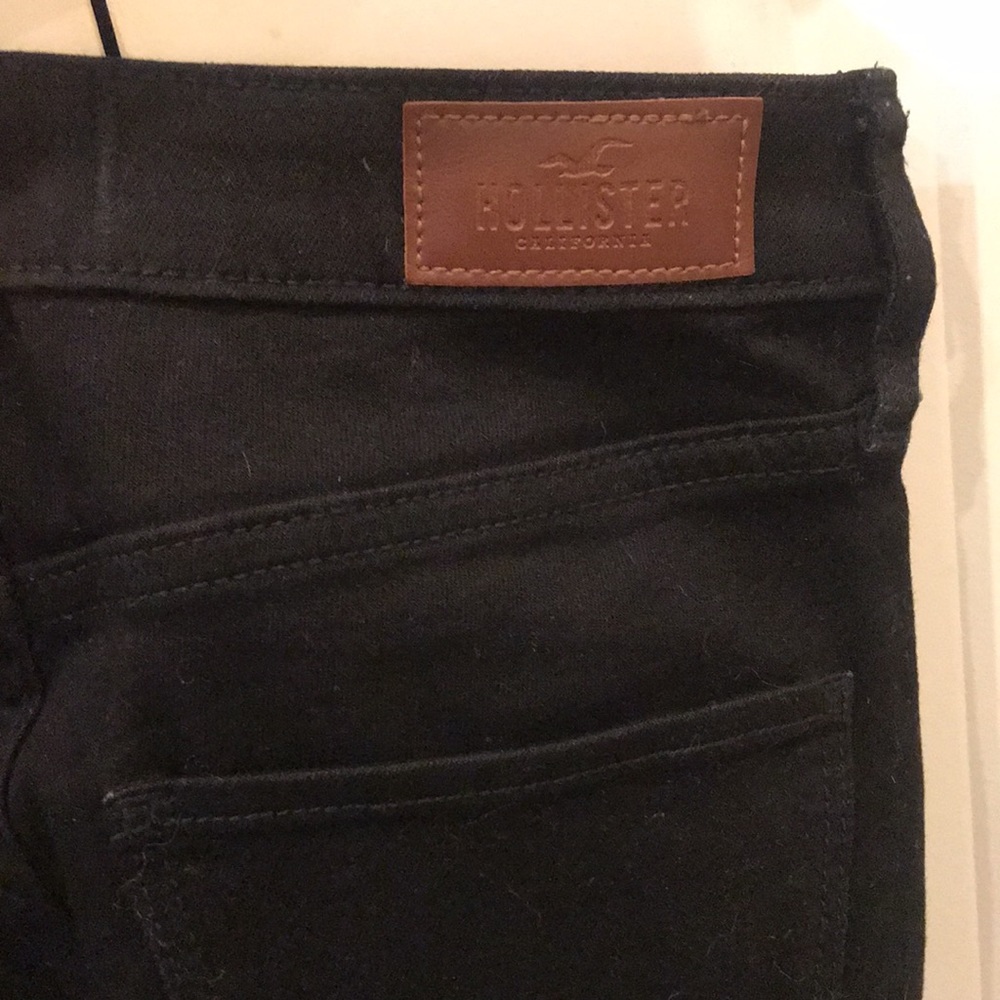 Hollister Mid Rise Super Skinny Distressed Black Jeans